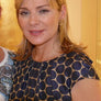 Kim Cattrall wearing Miguel Ases Gold Beaded Cascade Earrings